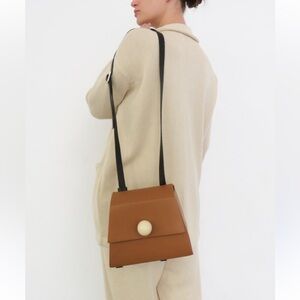 MATTER MATTERS GALLERY
MINI TRAPEZOID SHOULD BAG - BROWN Leather Crossbody Bag